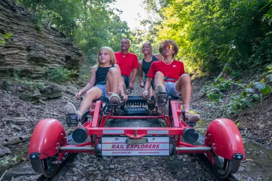 A family of 4 pedals through the limestone rock in Bluegrass, KY.