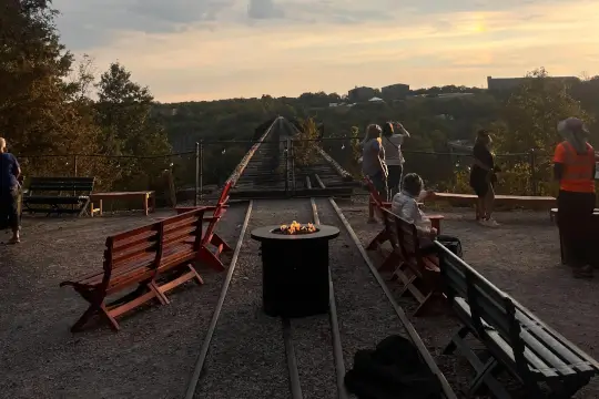 A cozy fire lights up the turnaround, overlooking the valley. 