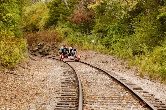 A family over 4 explore through the thoroughbred horse farms.