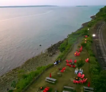 After arriving at the scenic Bayside Station, the group takes in the Ocean view.